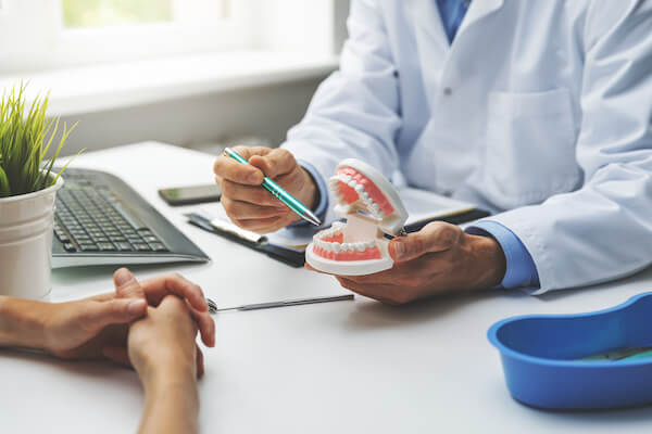 orthodontist speaking with patient