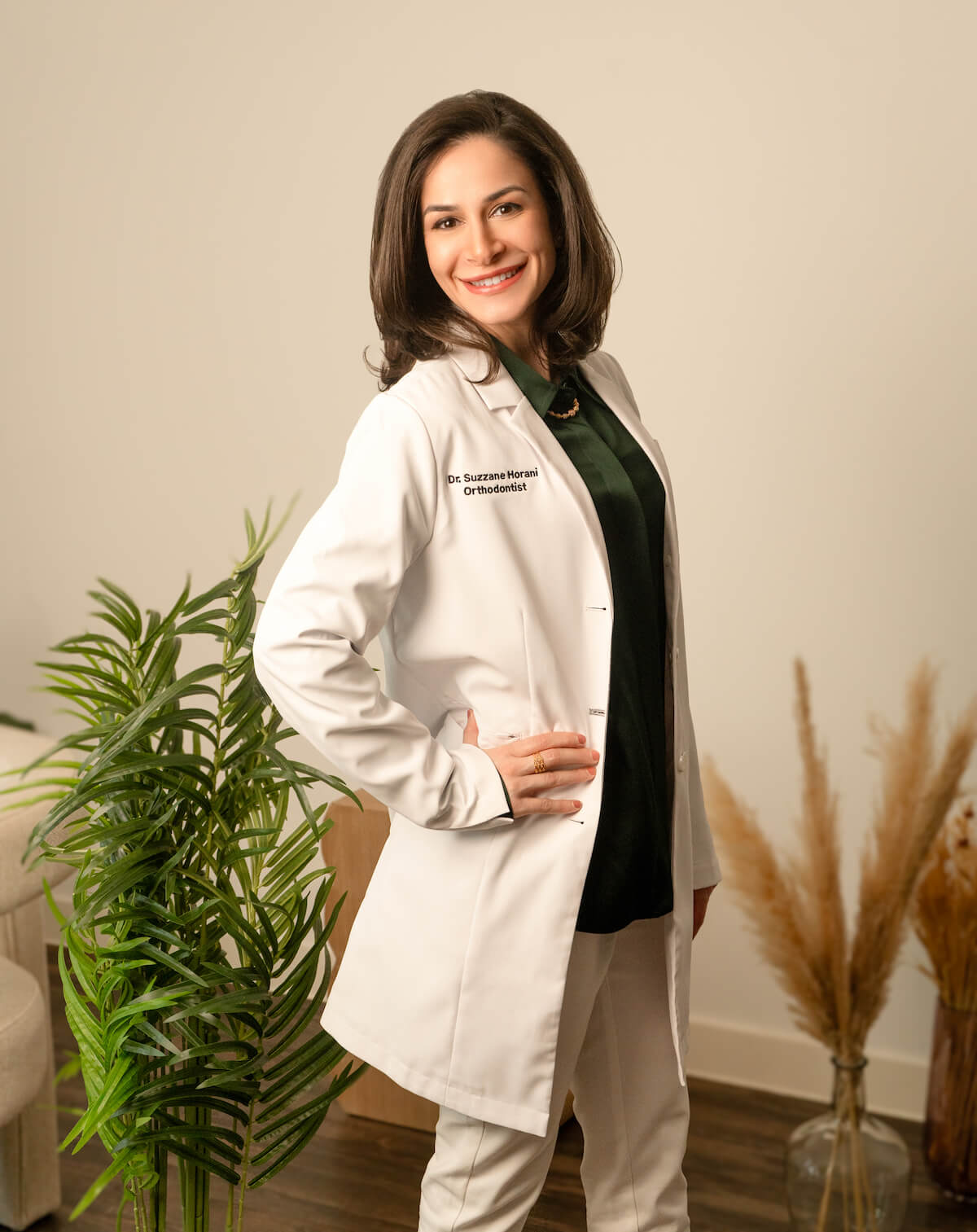 dr. horani smiling in white coat