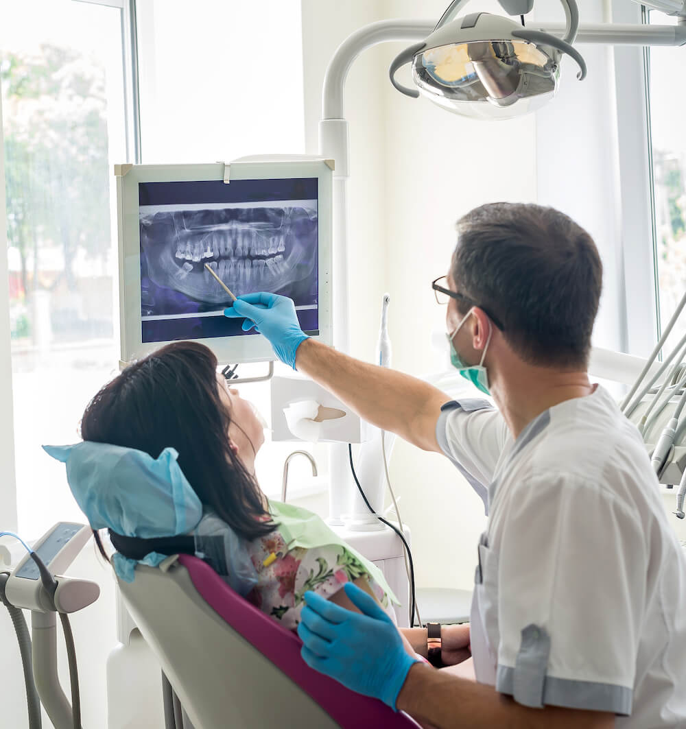 doctor showing patient scans